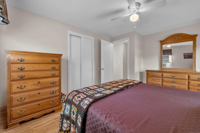 315 Judson Ave, Groton, CT 06355 - bedroom with light wood-style flooring, a closet, and a ceiling fan
