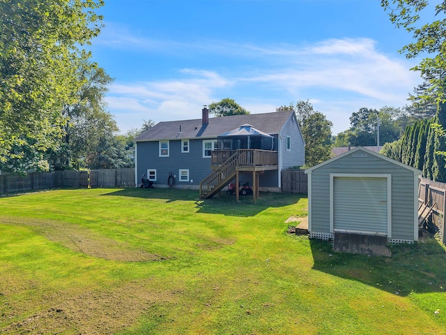 315 Judson Ave, Groton, CT 06355 - rear view of property with stairs, a storage shed, a sunroom, a fenced backyard, and a chimney