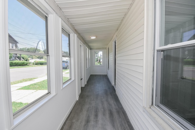 31 Chapman St, New Britain, CT 06051 - unfurnished sunroom with wood finished floors and wooden walls