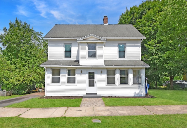 31 Chapman St, New Britain, CT 06051 - view of front of home featuring a chimney, a front lawn, and roof with shingles