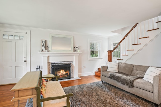 2 Clearview Ave, Norwalk, CT 06851 - living area with stairway, wood finished floors, a premium fireplace, and crown molding