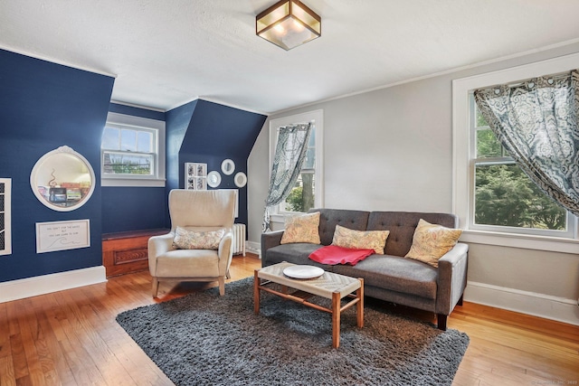 2 Clearview Ave, Norwalk, CT 06851 - living room with hardwood / wood-style floors, plenty of natural light, and crown molding