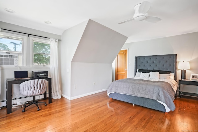 2 Clearview Ave, Norwalk, CT 06851 - bedroom with light wood-type flooring, cooling unit, baseboard heating, and a ceiling fan