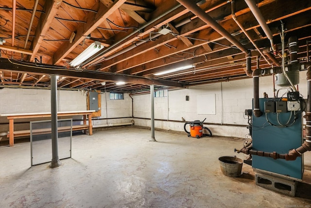 2 Clearview Ave, Norwalk, CT 06851 - unfinished basement with electric panel, a heating unit, and concrete block wall