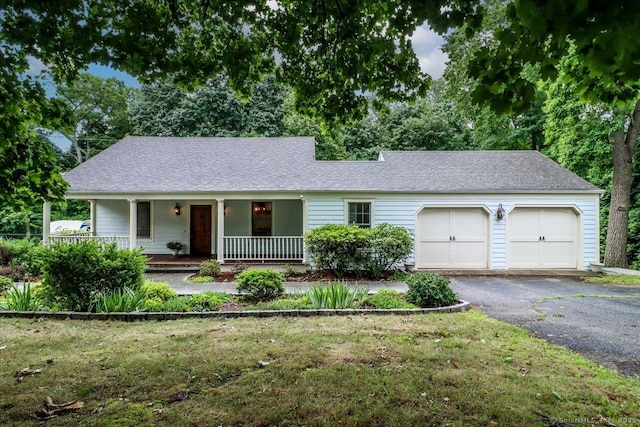 1384 N Benson Rd, Fairfield, CT 06824 - single story home with driveway, a porch, an attached garage, and a shingled roof