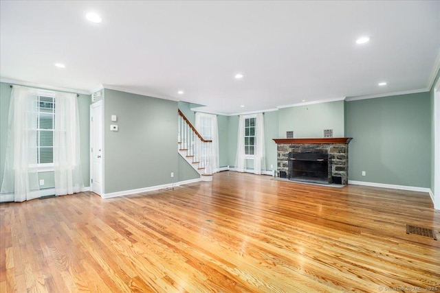 1384 N Benson Rd, Fairfield, CT 06824 - unfurnished living room featuring stairway, crown molding, recessed lighting, wood finished floors, and a fireplace