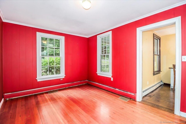 1384 N Benson Rd, Fairfield, CT 06824 - spare room featuring wood-type flooring, crown molding, and baseboard heating