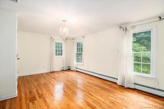 1384 N Benson Rd, Fairfield, CT 06824 - unfurnished room featuring plenty of natural light, a chandelier, light wood-style floors, a baseboard radiator, and crown molding