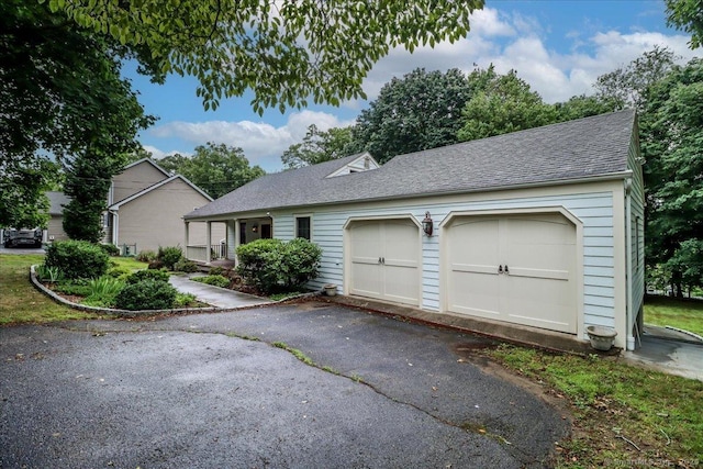 1384 N Benson Rd, Fairfield, CT 06824 - ranch-style home featuring a shingled roof, an attached garage, and asphalt driveway