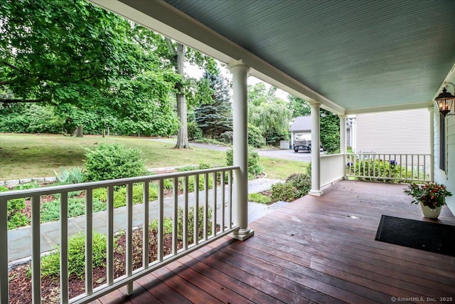 1384 N Benson Rd, Fairfield, CT 06824 - wooden porch with a yard