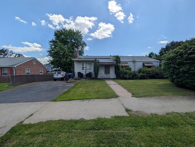56 Mitchell St, New Britain, CT 06053 - ranch-style home featuring a chimney and concrete driveway