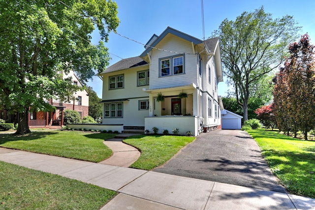 150 Westwood Rd, New Haven, CT 06515 - traditional-style house with a front yard, covered porch, an outbuilding, and a garage