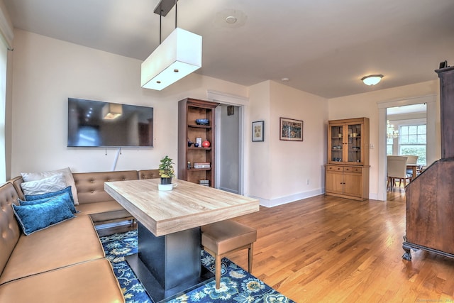 150 Westwood Rd, New Haven, CT 06515 - living area featuring light wood finished floors and baseboards