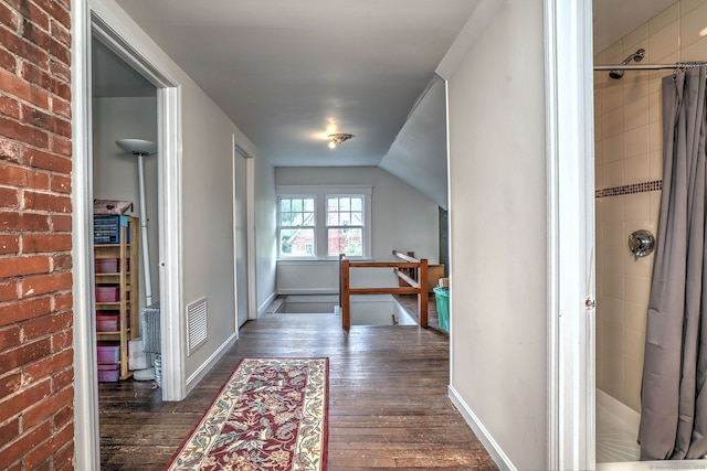 150 Westwood Rd, New Haven, CT 06515 - hall with dark wood-style floors and lofted ceiling