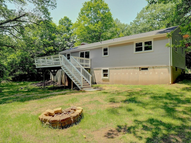 185 Hope Valley Rd, Hebron, CT 06231 - back of house featuring a fire pit, stairway, a wooden deck, and a yard