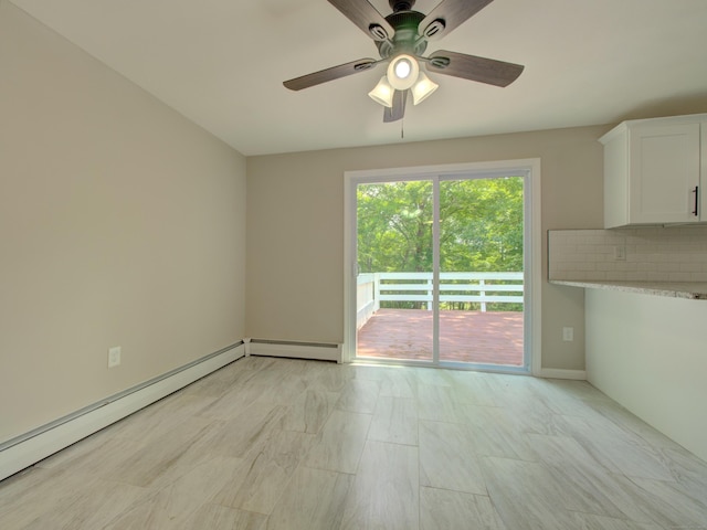 185 Hope Valley Rd, Hebron, CT 06231 - unfurnished dining area with a ceiling fan, a baseboard heating unit, and a baseboard radiator
