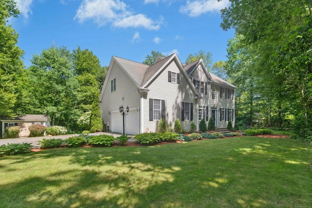 20 Lisbon Ter, Oxford, CT 06478 - view of front of house featuring an attached garage, a front yard, and concrete driveway
