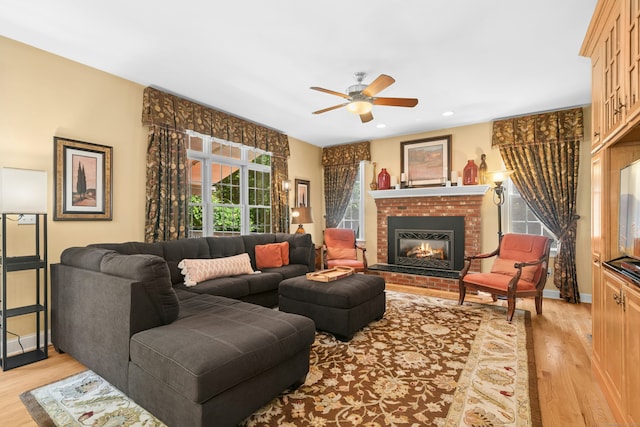 20 Lisbon Ter, Oxford, CT 06478 - living room featuring a ceiling fan, light wood-style floors, a brick fireplace, and recessed lighting