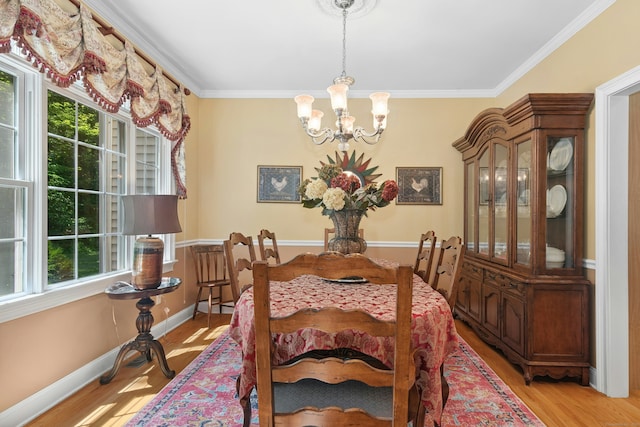 20 Lisbon Ter, Oxford, CT 06478 - dining space featuring a chandelier, plenty of natural light, ornamental molding, and light wood-type flooring