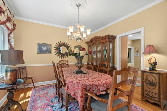 20 Lisbon Ter, Oxford, CT 06478 - dining space with ornamental molding, light wood-type flooring, and a chandelier