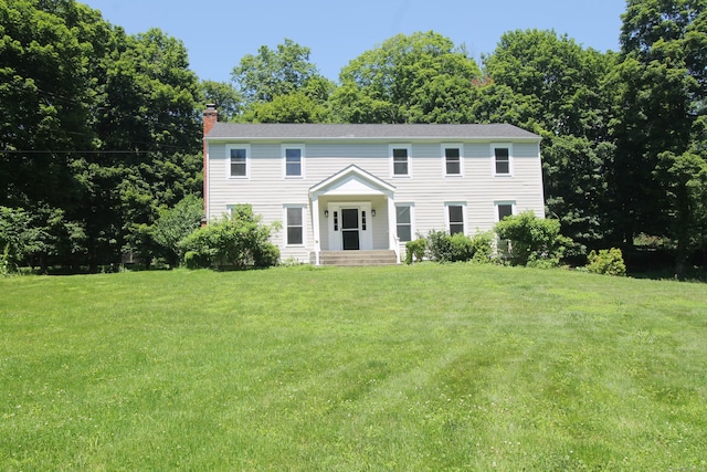 1 Quaker Ridge Rd, Sherman, CT 06784 - colonial house featuring a chimney and a front yard