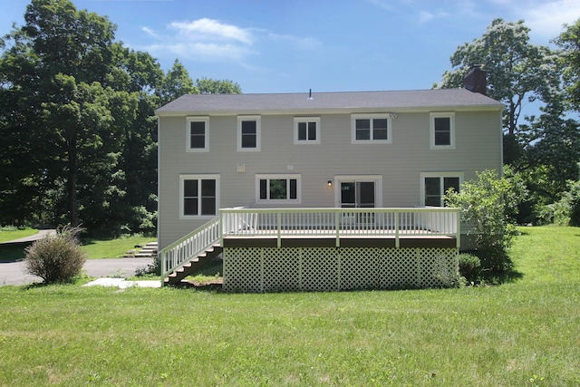 1 Quaker Ridge Rd, Sherman, CT 06784 - back of property featuring a chimney, a deck, a lawn, and stairway