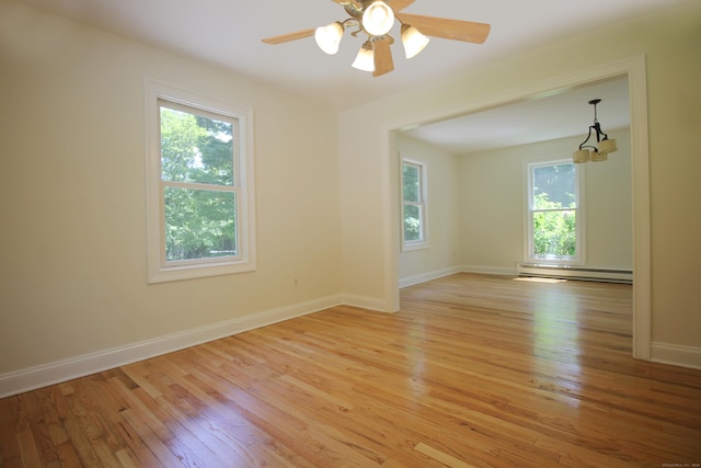 1 Quaker Ridge Rd, Sherman, CT 06784 - unfurnished room featuring plenty of natural light, a baseboard radiator, light wood finished floors, and a ceiling fan