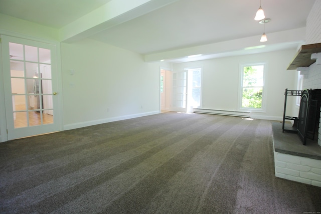 1 Quaker Ridge Rd, Sherman, CT 06784 - unfurnished living room with baseboard heating, a fireplace, carpet, and plenty of natural light