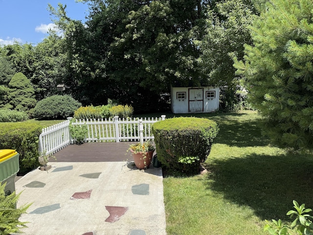 28 Maplerow Ave, Waterbury, CT 06705 - view of patio with a storage unit and a wooden deck