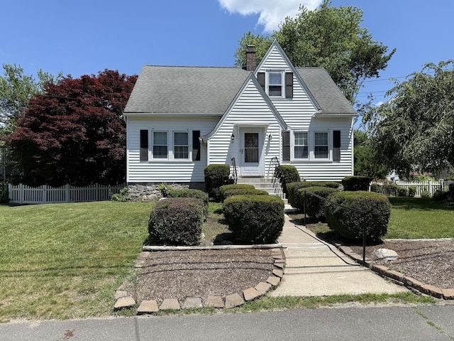 28 Maplerow Ave, Waterbury, CT 06705 - view of front of house with a chimney and roof with shingles