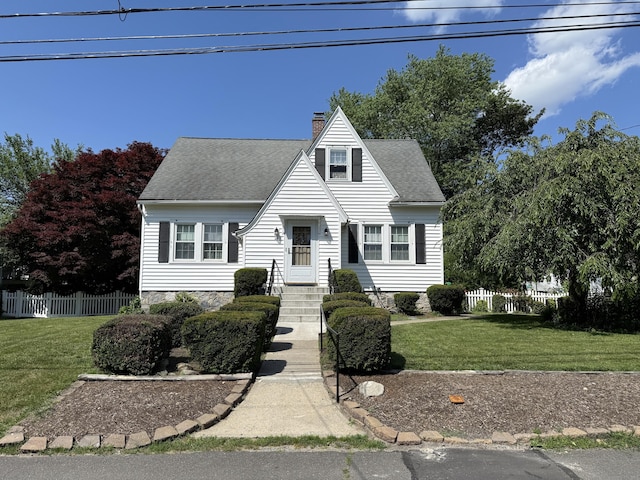 28 Maplerow Ave, Waterbury, CT 06705 - cape cod house with a chimney and roof with shingles