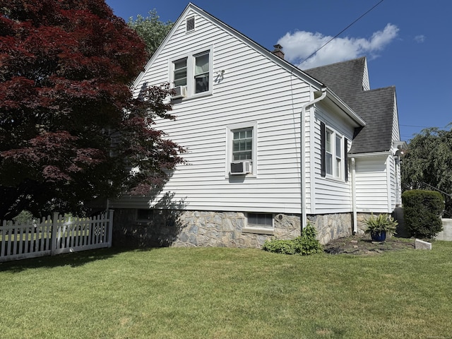 28 Maplerow Ave, Waterbury, CT 06705 - view of property exterior with cooling unit and roof with shingles