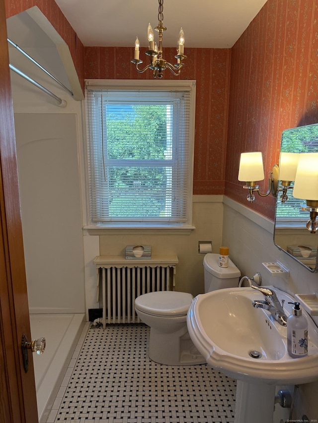28 Maplerow Ave, Waterbury, CT 06705 - full bath featuring radiator heating unit, a chandelier, a shower stall, and wallpapered walls