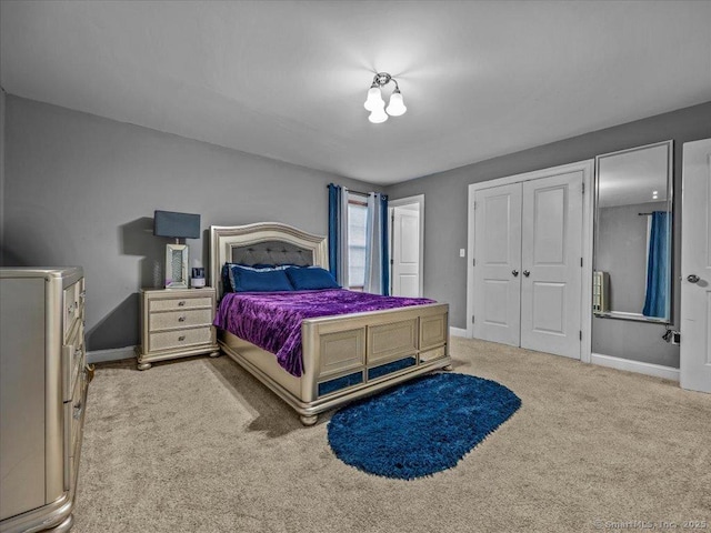 126 Conrad Dr, New Haven, CT 06515 - carpeted bedroom with baseboards and a closet