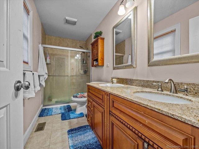 126 Conrad Dr, New Haven, CT 06515 - full bath with double vanity, a shower stall, and tile patterned flooring