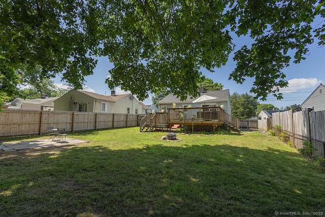 18 Hull Dr, Southington, CT 06479 - fenced backyard featuring a wooden deck, a fire pit, and stairs