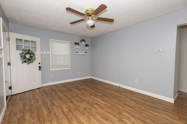 18 Hull Dr, Southington, CT 06479 - empty room featuring wood finished floors, a textured ceiling, and a ceiling fan