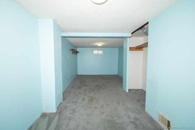 18 Hull Dr, Southington, CT 06479 - basement featuring carpet and a textured ceiling