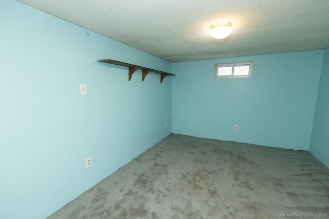 18 Hull Dr, Southington, CT 06479 - basement featuring carpet floors and a textured ceiling