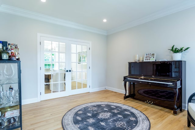 81 Salem Rd, Trumbull, CT 06611 - living area featuring wood finished floors, french doors, ornamental molding, and recessed lighting