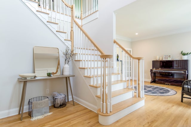81 Salem Rd, Trumbull, CT 06611 - stairway featuring wood finished floors and crown molding