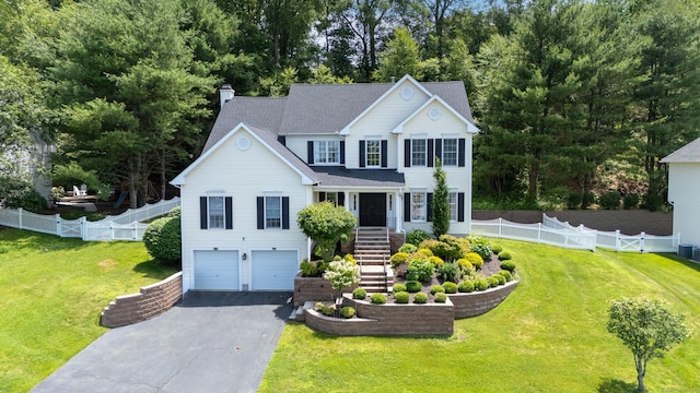 81 Salem Rd, Trumbull, CT 06611 - view of front of property with stairs, asphalt driveway, an attached garage, a chimney, and a shingled roof