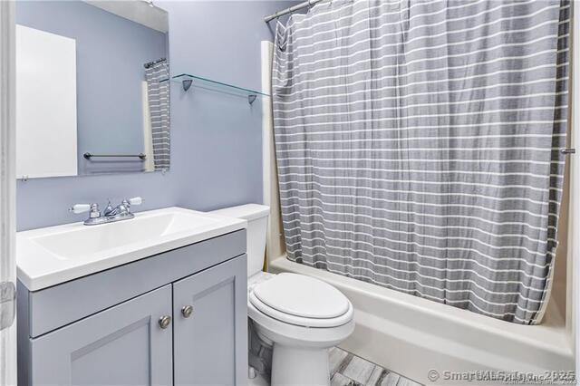 175 Mill Pond Rd Unit 203, Hamden, CT 06514 - full bathroom with shower / tub combo and vanity