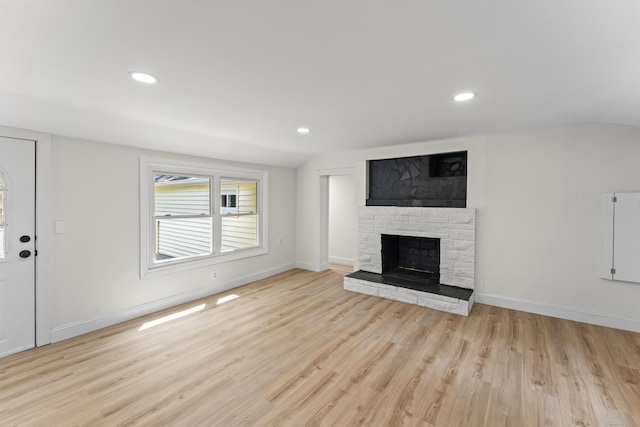 40 Clearview Rd, East Haddam, CT 06469 - unfurnished living room featuring light wood-style flooring, a fireplace, recessed lighting, and vaulted ceiling