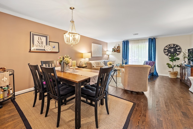 250 Summer St Unit 29, Southington, CT 06479 - dining space featuring a chandelier, crown molding, and wood finished floors