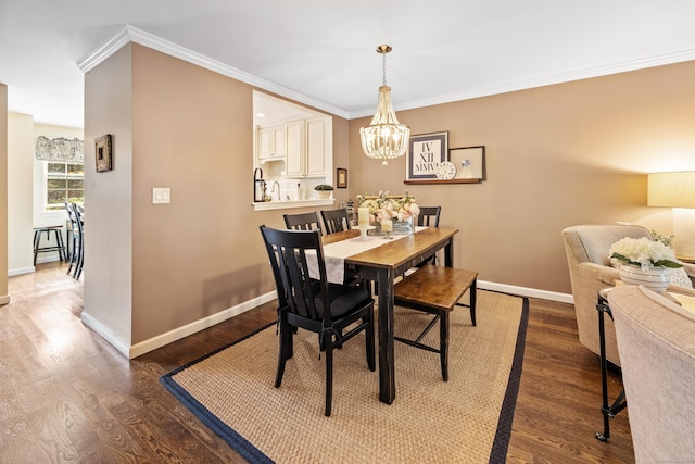 250 Summer St Unit 29, Southington, CT 06479 - dining room featuring crown molding, a chandelier, and wood finished floors