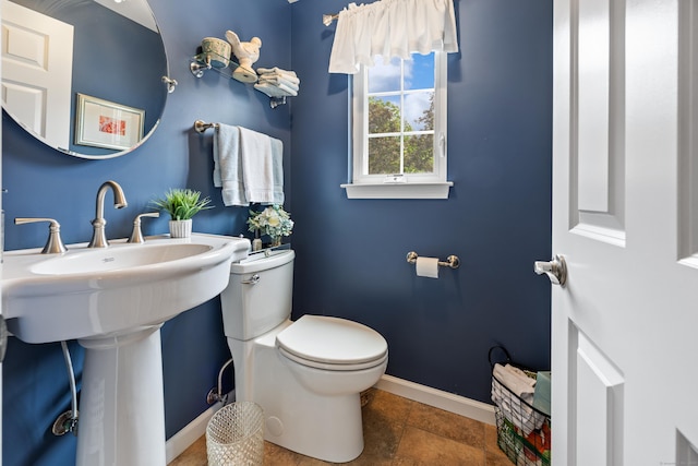 250 Summer St Unit 29, Southington, CT 06479 - half bathroom featuring toilet and tile patterned flooring