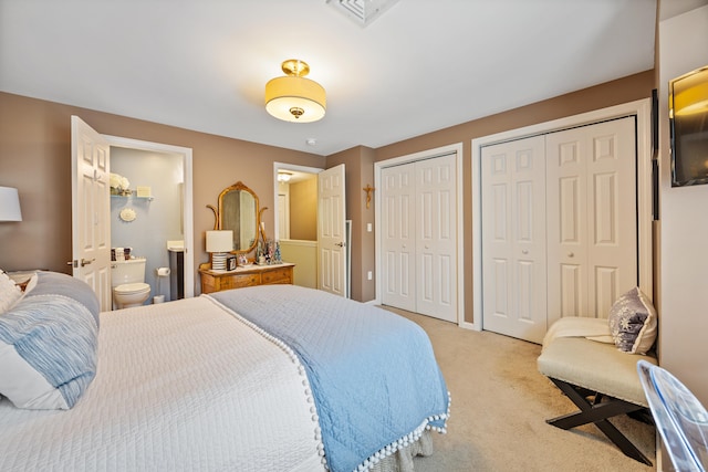 250 Summer St Unit 29, Southington, CT 06479 - bedroom featuring two closets, light colored carpet, and connected bathroom