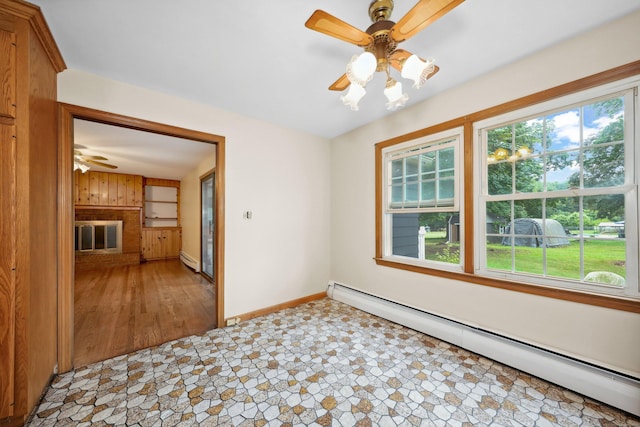 120 Knowles Ave, Southington, CT 06479 - spare room with a baseboard radiator and ceiling fan