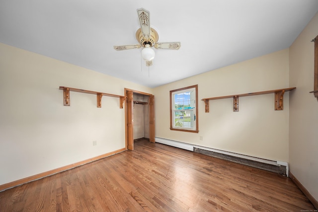 120 Knowles Ave, Southington, CT 06479 - unfurnished bedroom with a baseboard radiator, wood finished floors, and ceiling fan
